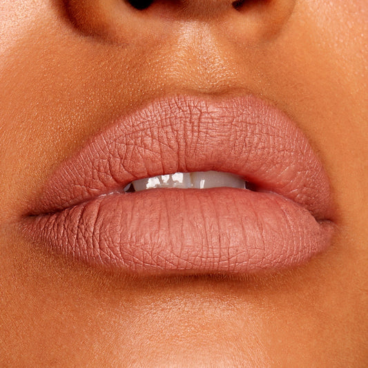 Full lips lined and filled with BFF Lippie Pencil by ColourPop in a nude-rose matte, showcasing precise definition and smooth payoff; studio close-up highlighting the long-wearing ColourPop Lippie Pencil finish.