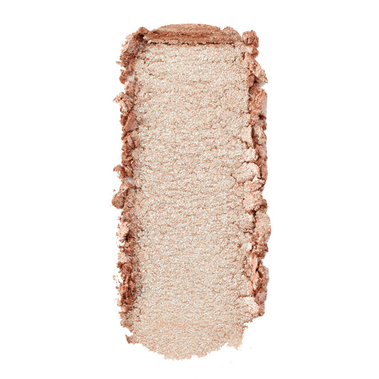Sailor Super Shock Shadow by ColourPop swatched in a single rectangular swipe - shimmery champagne‑beige eyeshadow with fine silver sparkle and soft, creamy texture - shown with slightly crumbled edges on a white background.