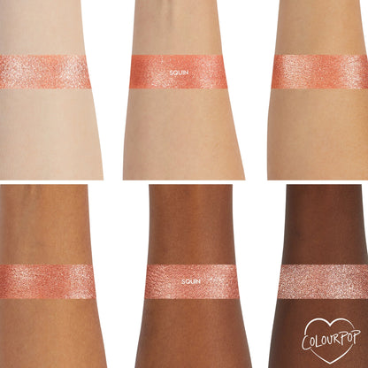 Sequin Super Shock Shadow swatch gleams across six forearms, showing smooth, opaque payoff on light to deep skin tones; a metallic rose‑gold copper shimmer band on each arm, with the ColourPop heart logo in the bottom right.